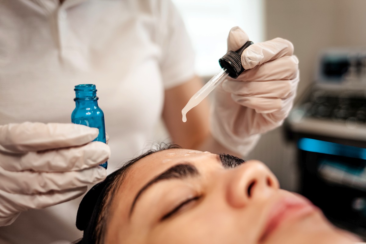 doctor beautician applies oil to the skin of the f 2024 10 21 00 56 26 utc
